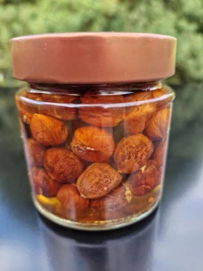 Lískové ořechy v medu 220g